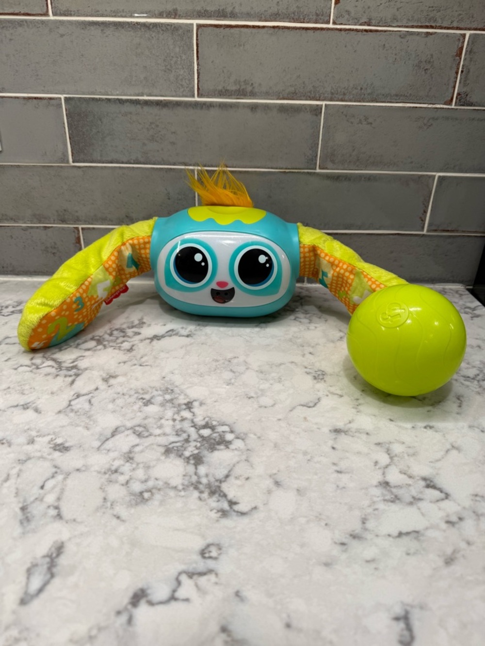 Interactive Teal and Lime Plush Kids Toy with Ball